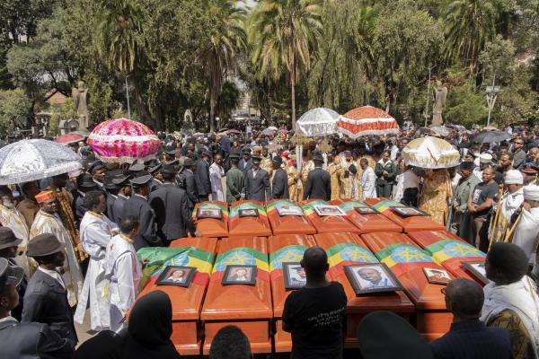 Maheder Tadese | Ethiopian Airlines Crash  - Pallbearers and other people attend the burial ceremony...
