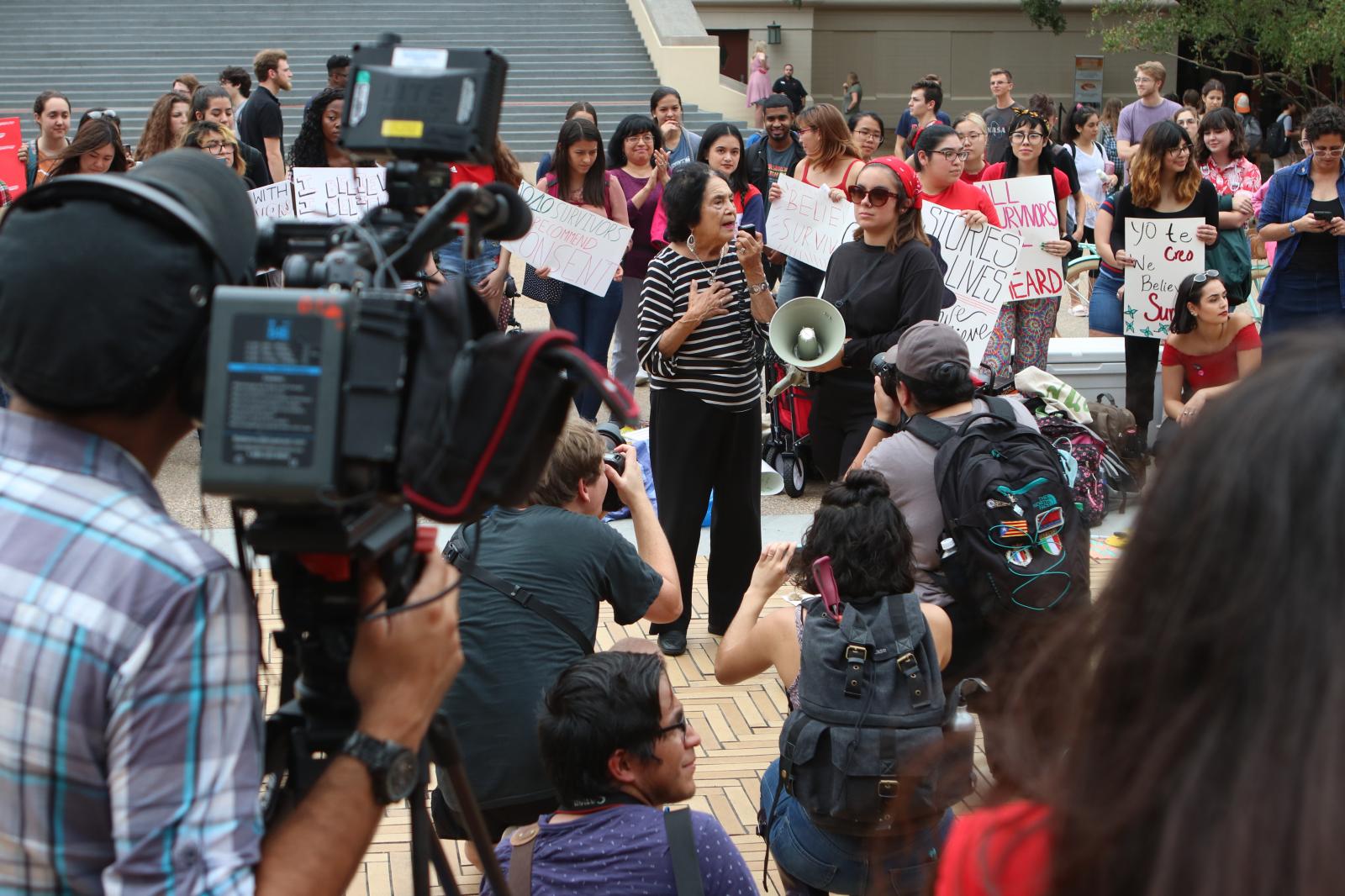 Dolores Huerta is surrounded by...ent at Gregory plaza on Oct. 9.