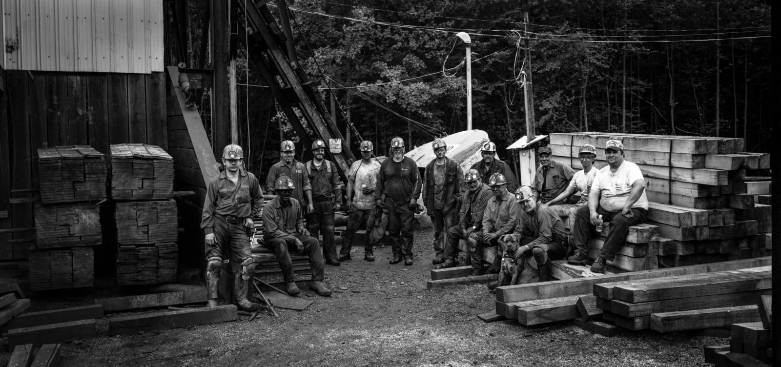 Image from The Portraits -   Orchard Slope Mine crew with dog  