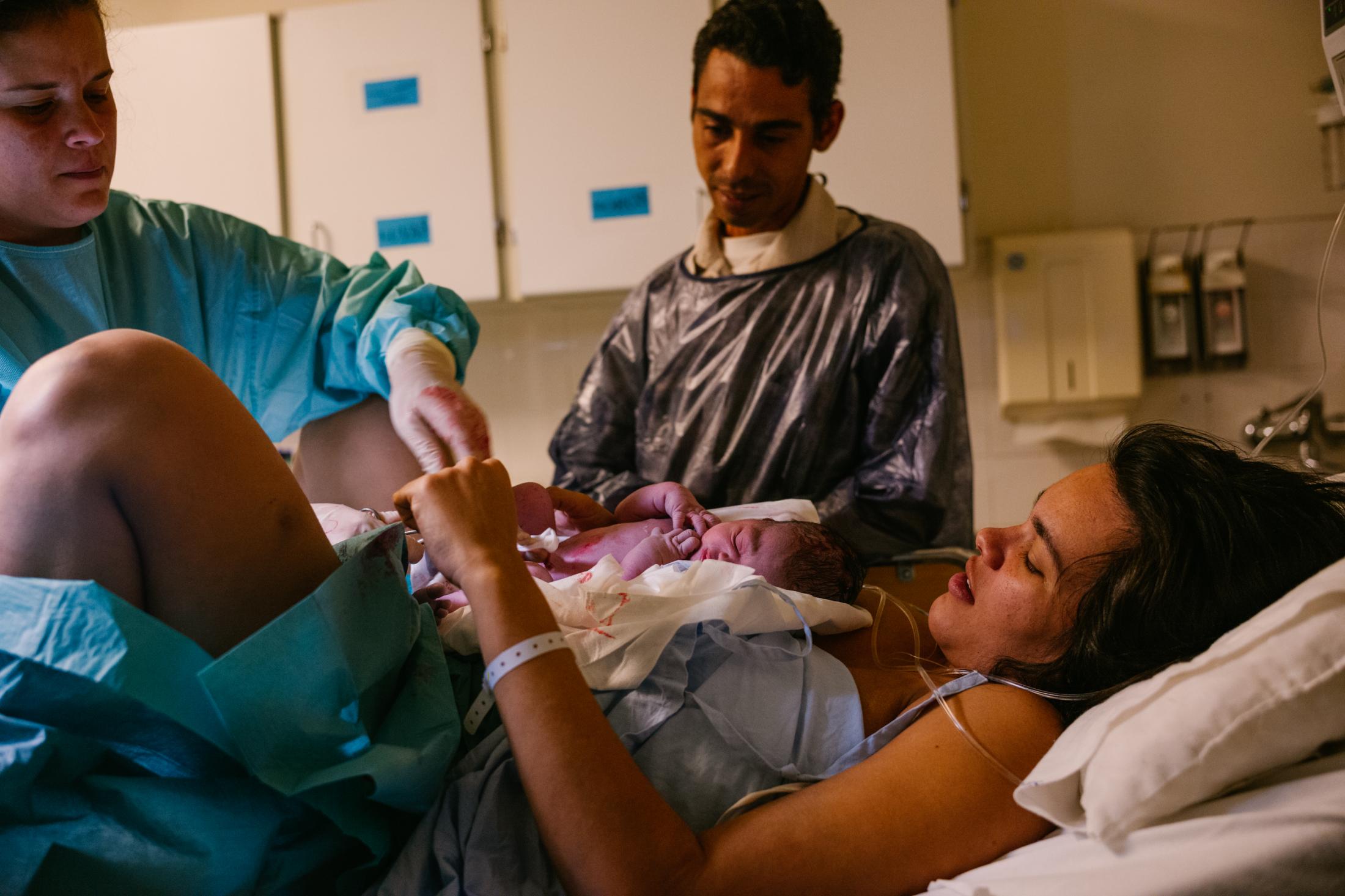 Carla and Josu&eacute; look at their newborn son at Hospital Dr. N&eacute;lio Mendon&ccedil;a in Funchal, Madeira, Portugal. 2nd January 2019. Medical care in Carla and Josu&eacute;&acute;s homeland of Venezuela is too precarious: since Maduro&#39;s rise to power, hospitals have lacked staff and medication, and the number of mothers and children who die at birth has skyrocketed. Carla arrived in Madeira in August 2018, Josu&eacute; followed in November. They want to start a new life on the island.