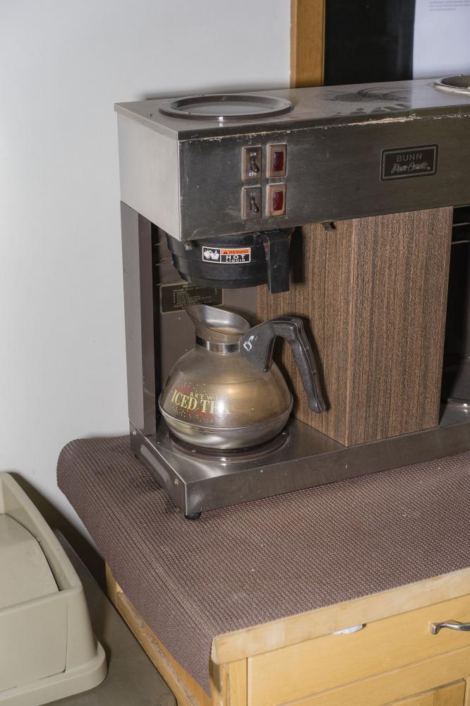 A coffee pot sits on a counter in the office of the Creston News Advertiser in Creston, Iowa on...