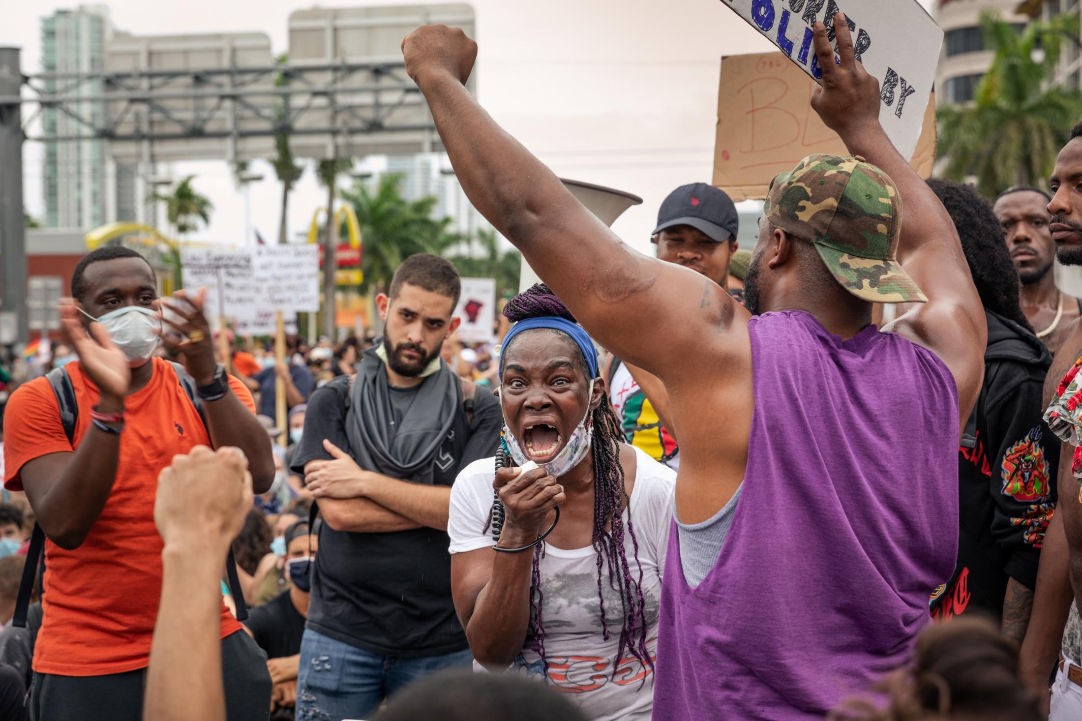 Miami, Black Lives Matter Protests - BLM Protest on Biscayne Blvd, Miami, Florida June 6, 2020 A woman tells the story of how she was...