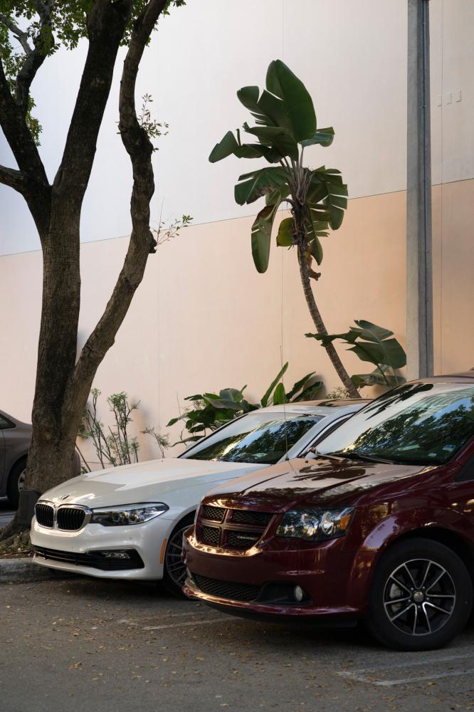 Image from Miami Bites - Car are parked in the Coconut Grove district in Miami,...