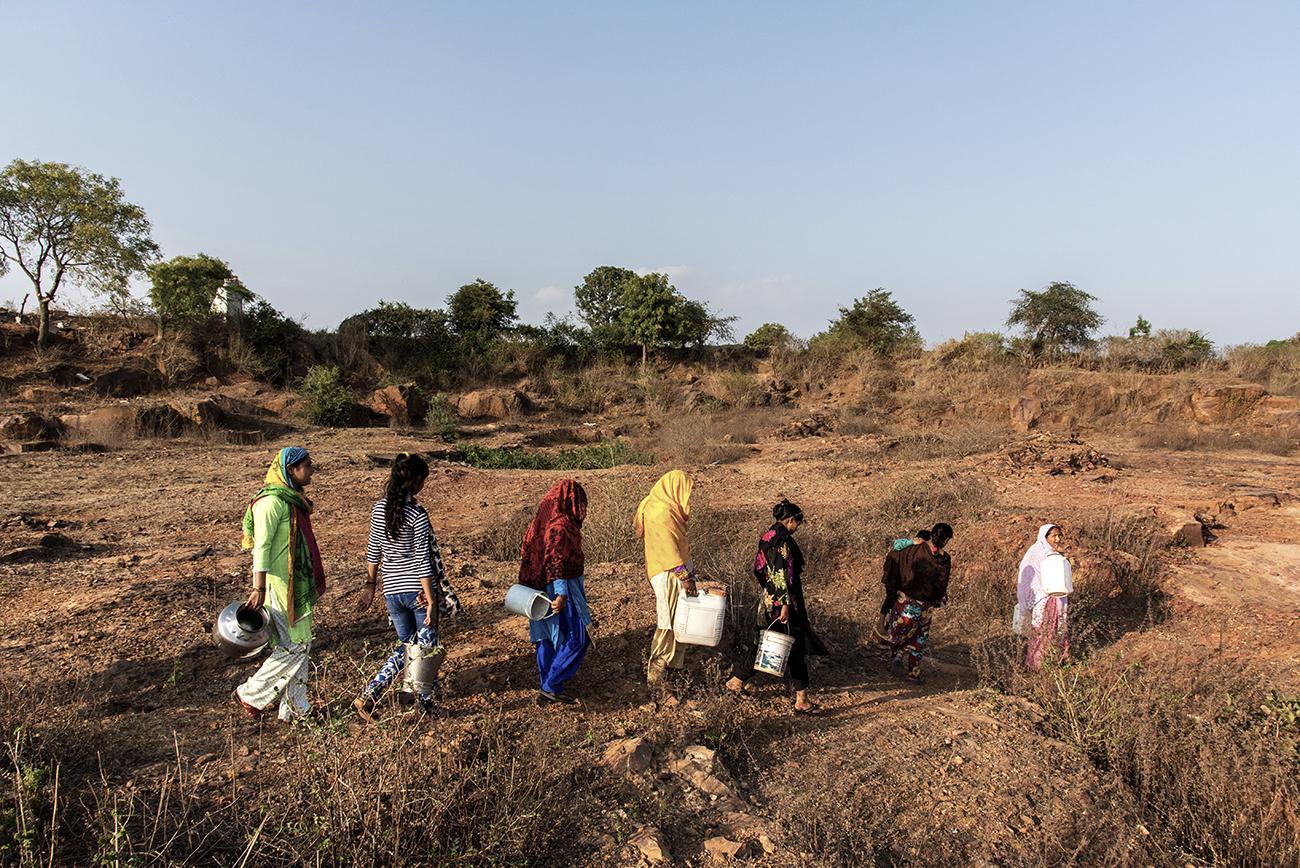 Women in Anandpura basti had to... 1 kilometer from the township.
