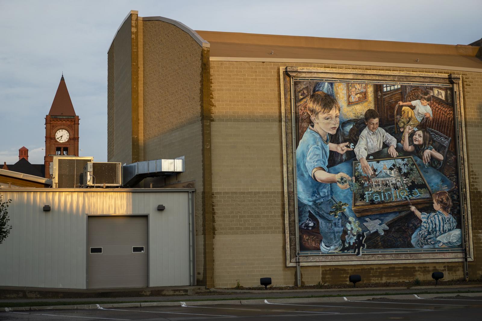 A mural welcomes visitors to Fa... McGinnis for Politico Magazine