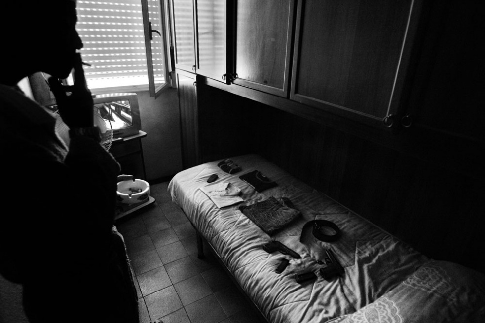 Naples,Scampia neighborhood,in ...ils" a pusher in his room.