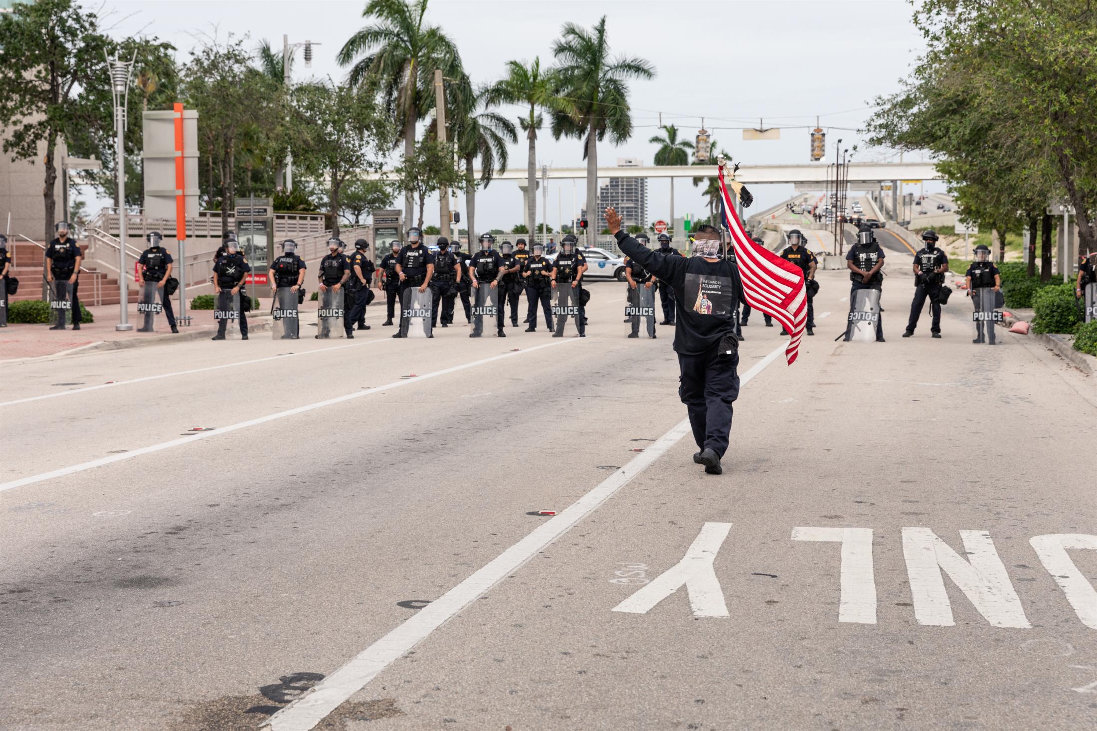 Miami, Black Lives Matter Protests - BLM Protest on Biscayne Blvd, Miami, Florida June 6, 2020 A Native American protestor approaches...