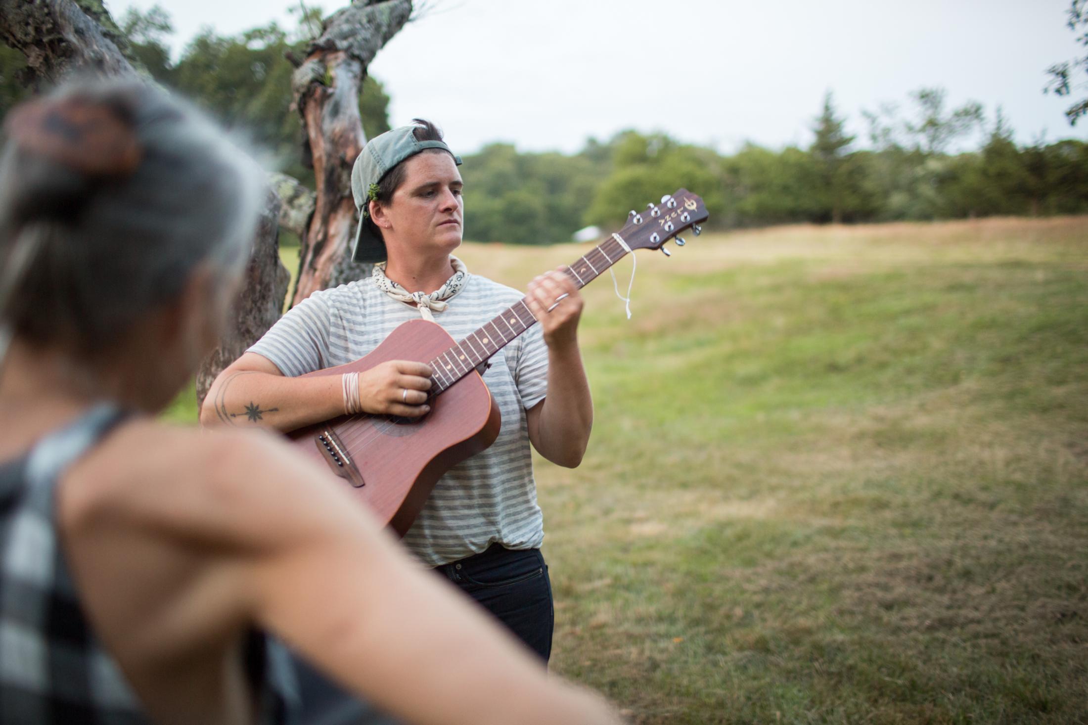 Oh, Farmer - Layton Guenther plays guitar in the Quail Hill Farm orchard