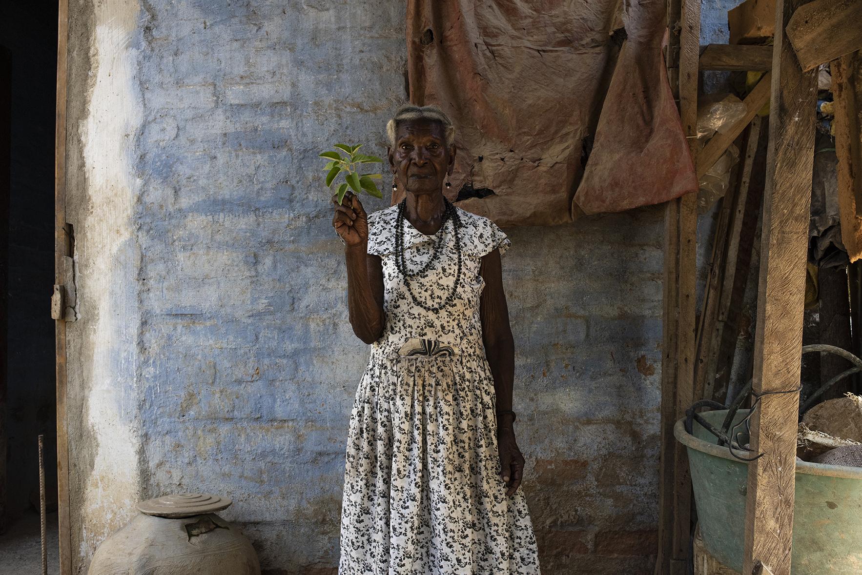 ROSALINA: Traditional Healers in San Basilio Palenque.(ongoing) -  Rosalina is posing for a picture showing a curative...