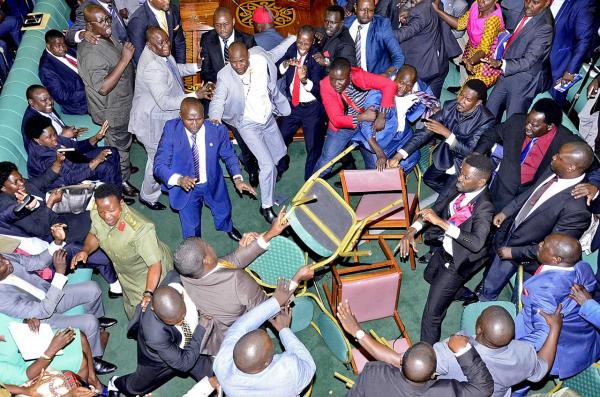  Alex Esagala  3rd Place, News  Age Limit Fight Members of the 10th Parliament come to blows during a debate over possible amendments to the Ugandan Constitution on 26th September 2017. The discussion descended into chaos during an attempt by opposition legislators to block the tabling of the so-called &ldquo;Age Limit&rdquo; motion by Igara West MP Raphael Magyezi, which called for wide-ranging constitutional changes including the removal of the age limit for the presidency.   