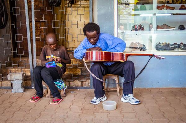 Image from 2018 PEOPLE CATEGORY WINNERS  -  Douglas Musunga  Honorable Mention, People  Coins for...
