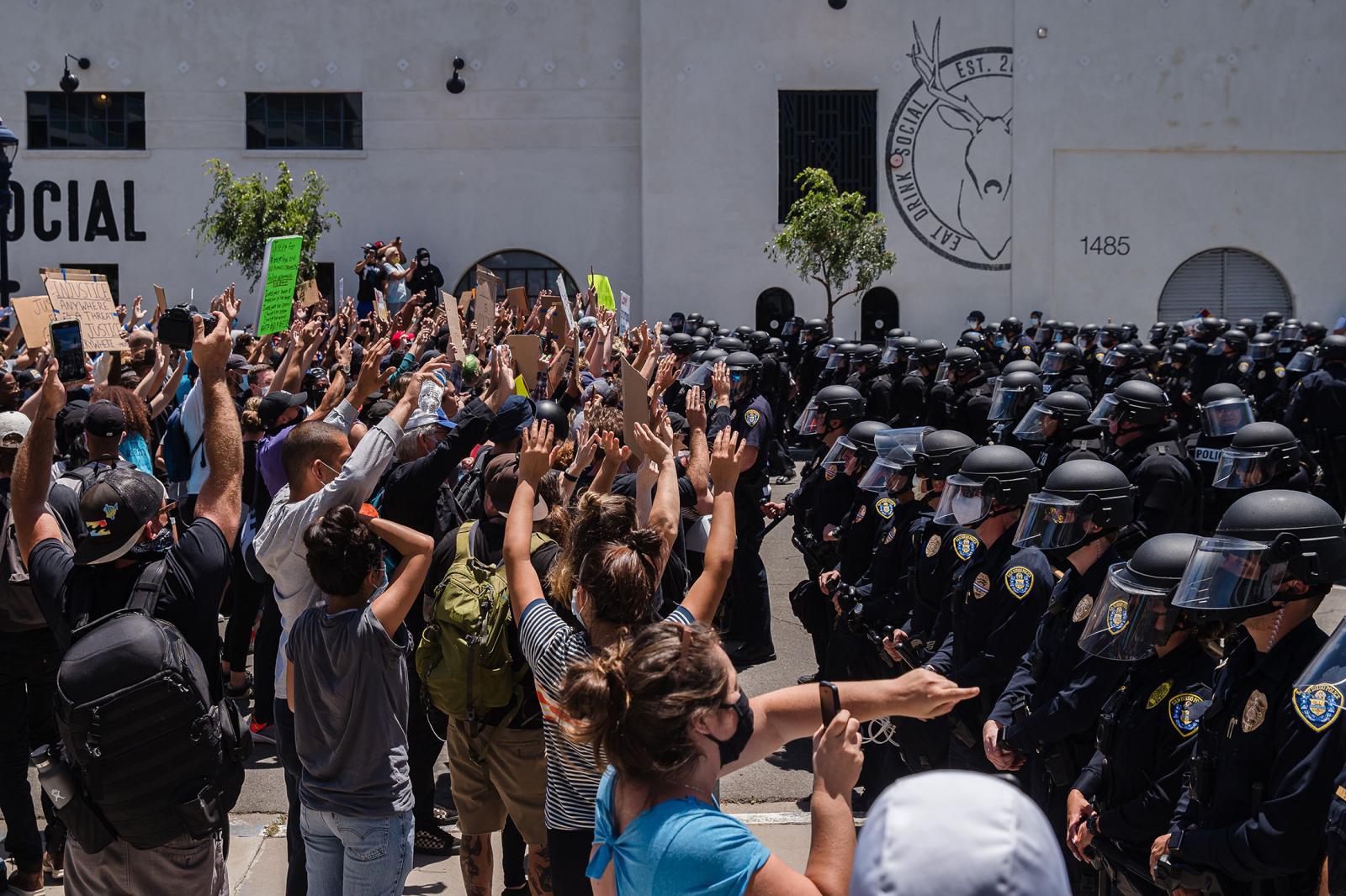 United States - Demonstrators gather in front of the San Diego Police in...