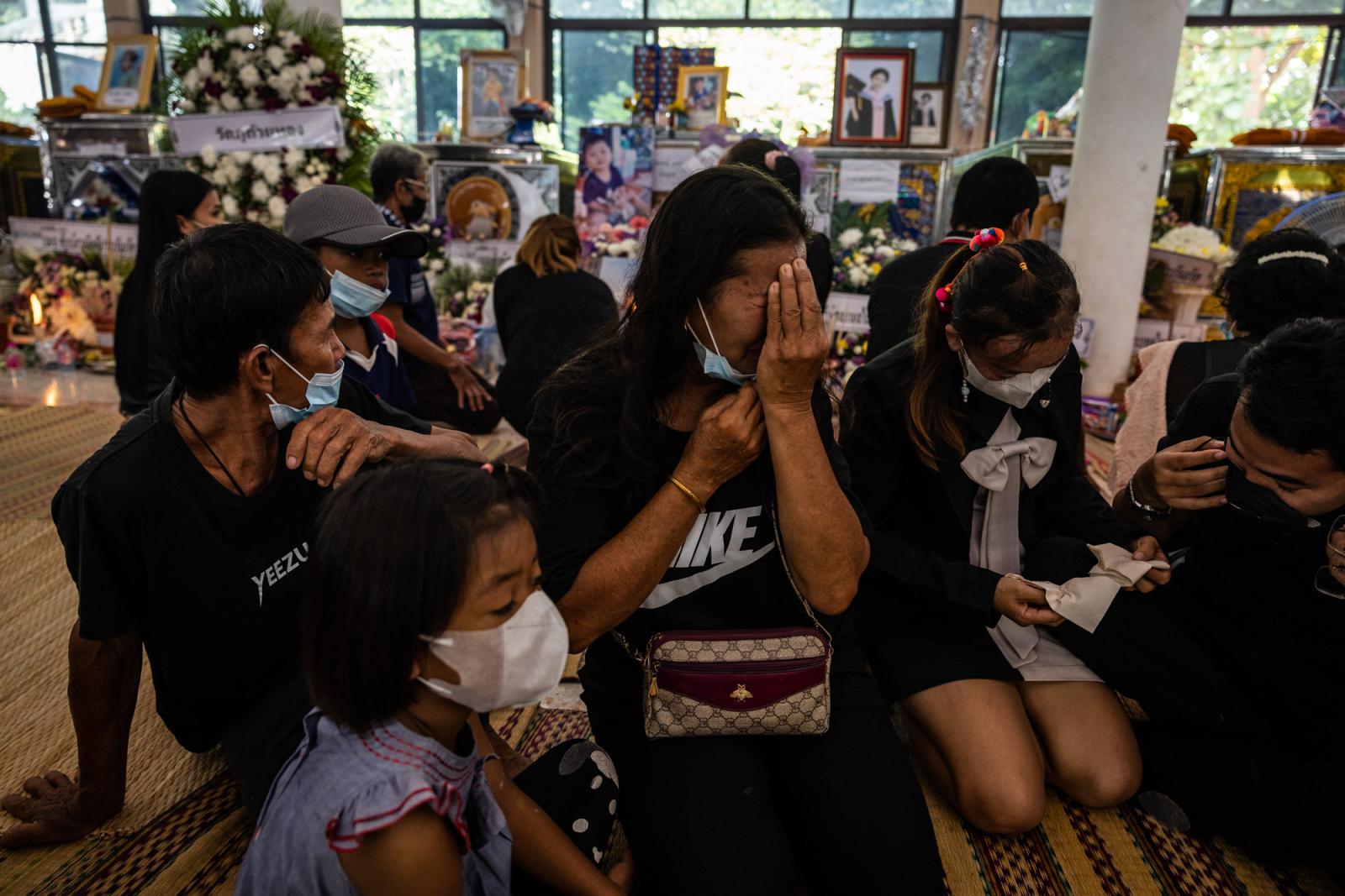 A family mourns the victims of ...phu, Thailand, October 8, 2022.