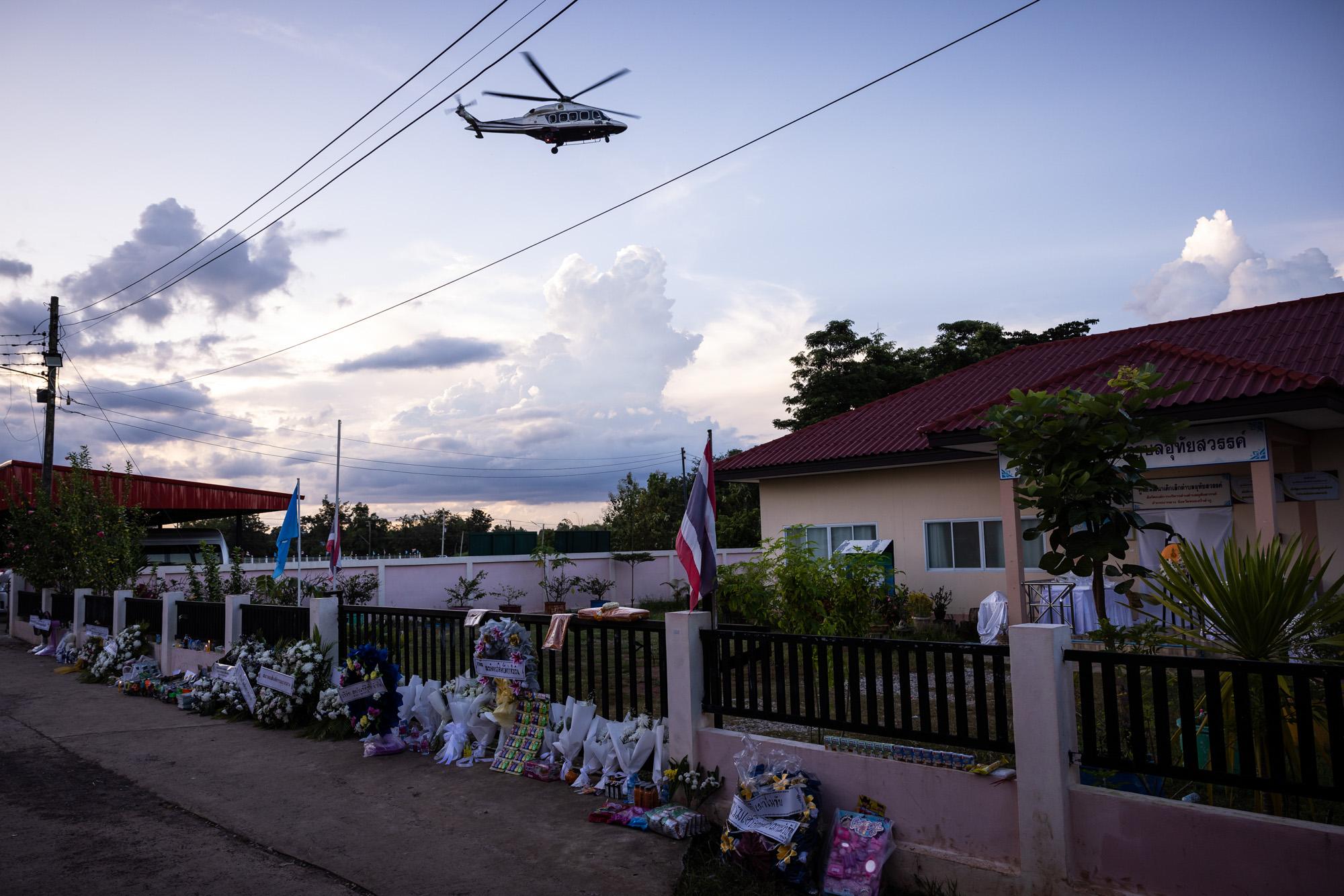 Shooting in Nong Bua Lamphu: The New York Times - The helicopter with the departing deputy police...