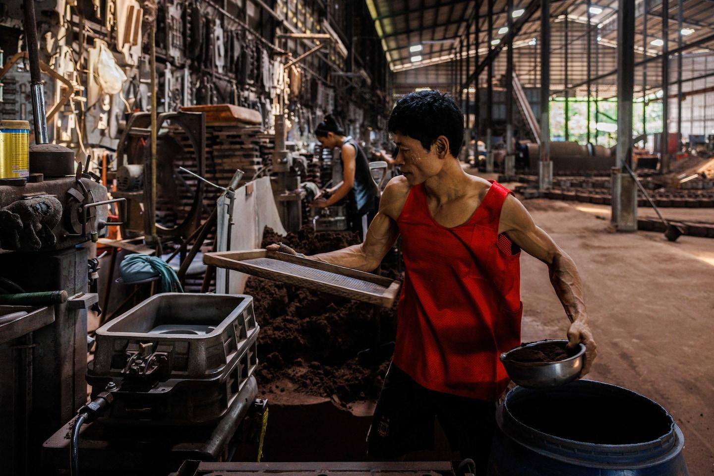 Amid record heat, even indoor factory workers enter dangerous terrain