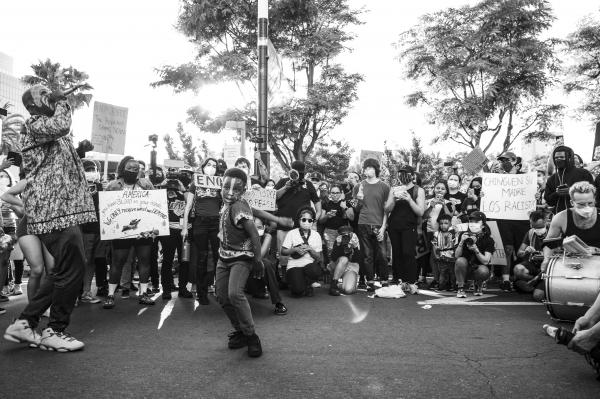 Image from Black Lives Matter 2020 Protests - Father and son leading in dance during the protest...