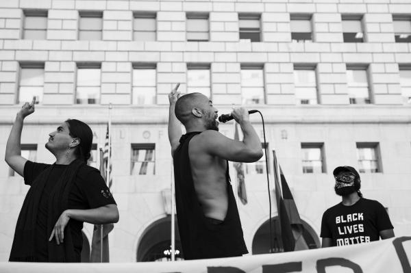 Image from Black Lives Matter 2020 Protests - Activist Kendrick Sampson addresses the sheriff with an...
