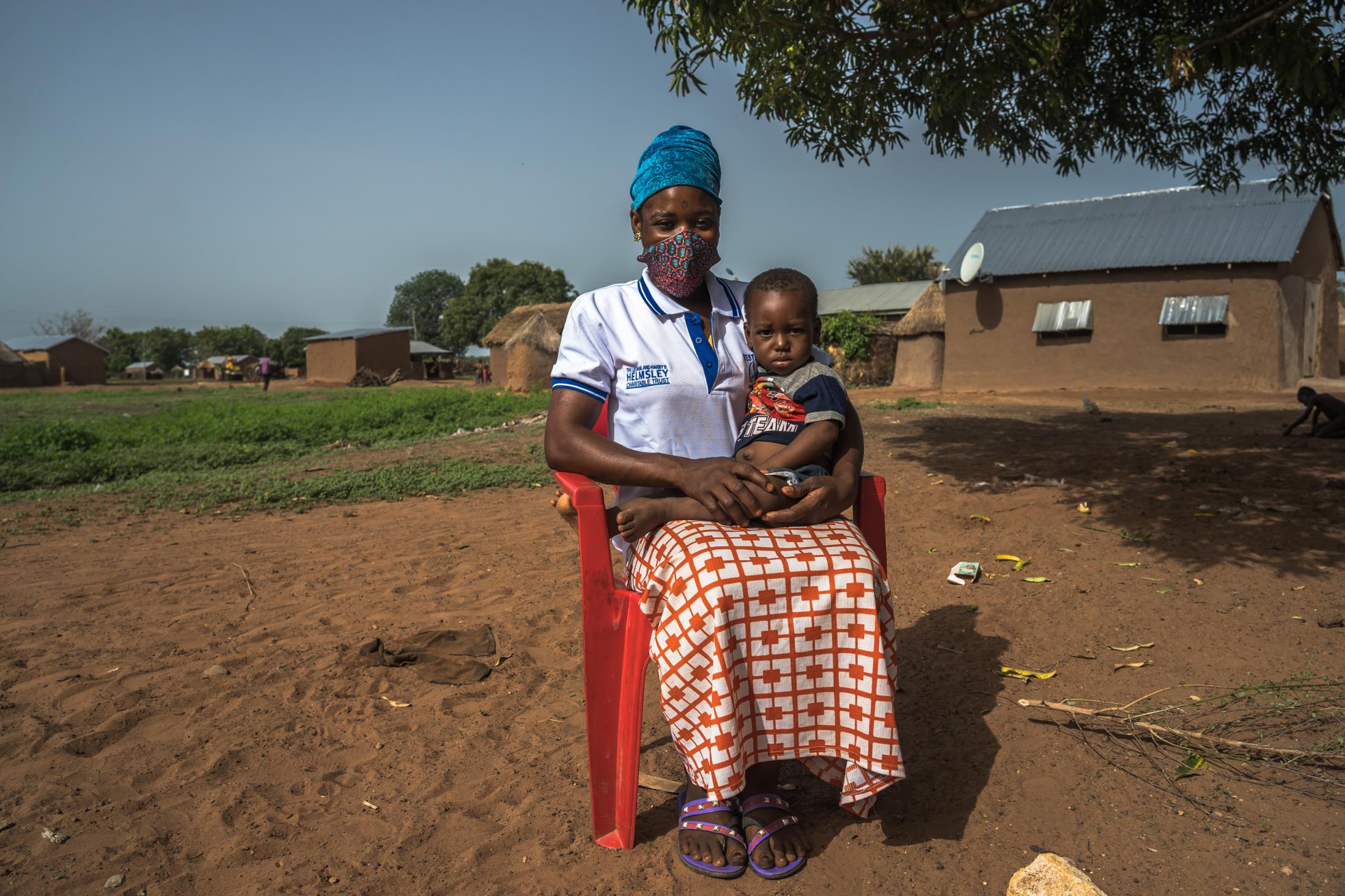 Covid-19 Response in Northern Ghana - Rahi Awudu (29)and her son at Bugyapala community,...