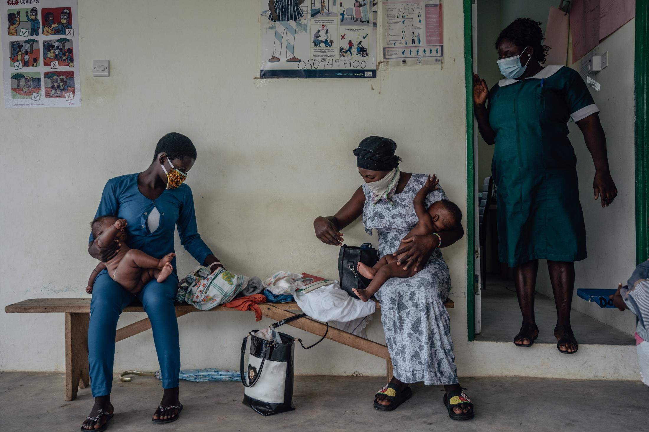 Covid-19 Response in Northern Ghana - Mothers at Awaradone CHPS bring their babies for routine...