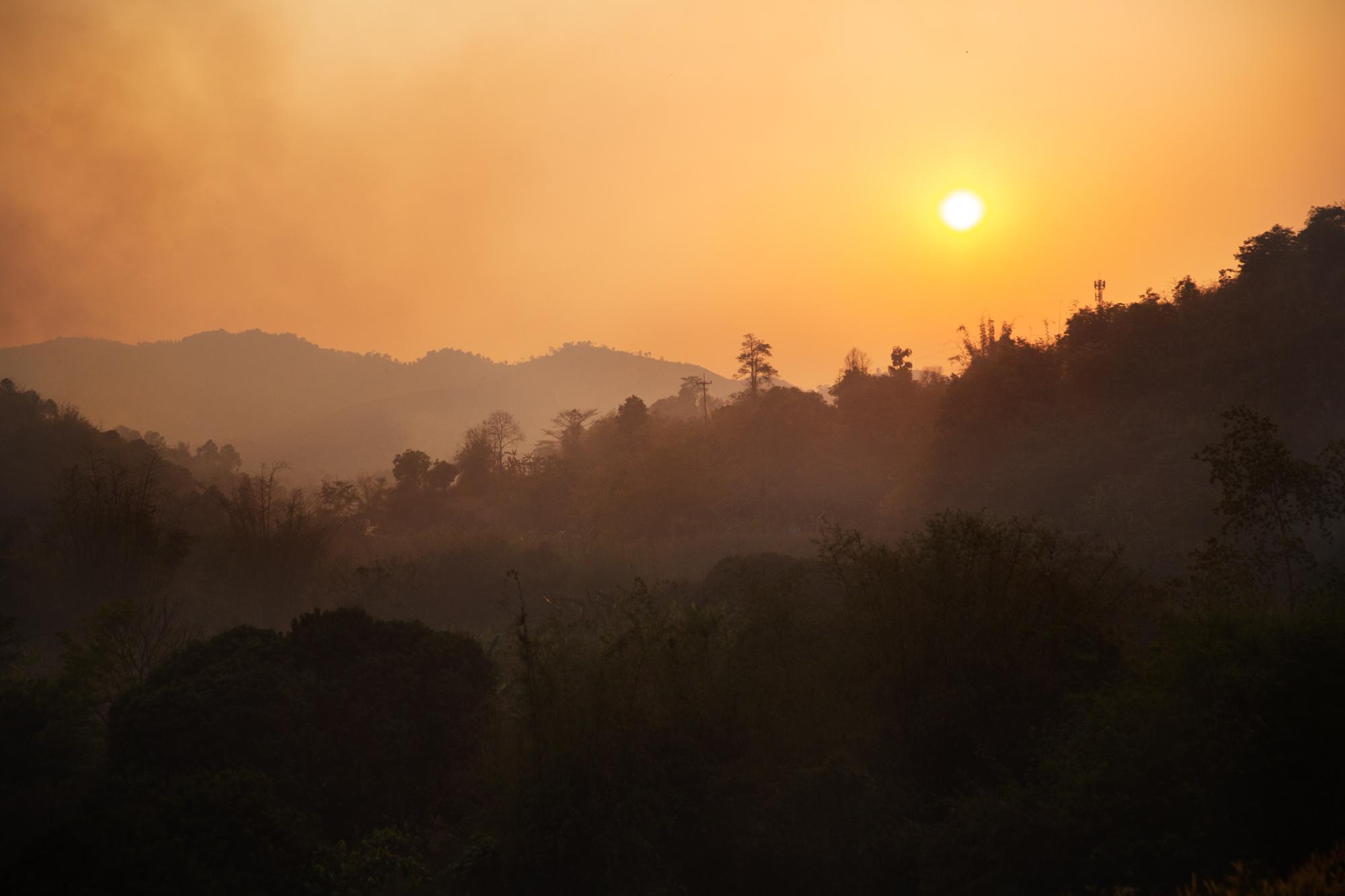 Thailand Burns - Smoke from multiple forest fires fills the air over a...