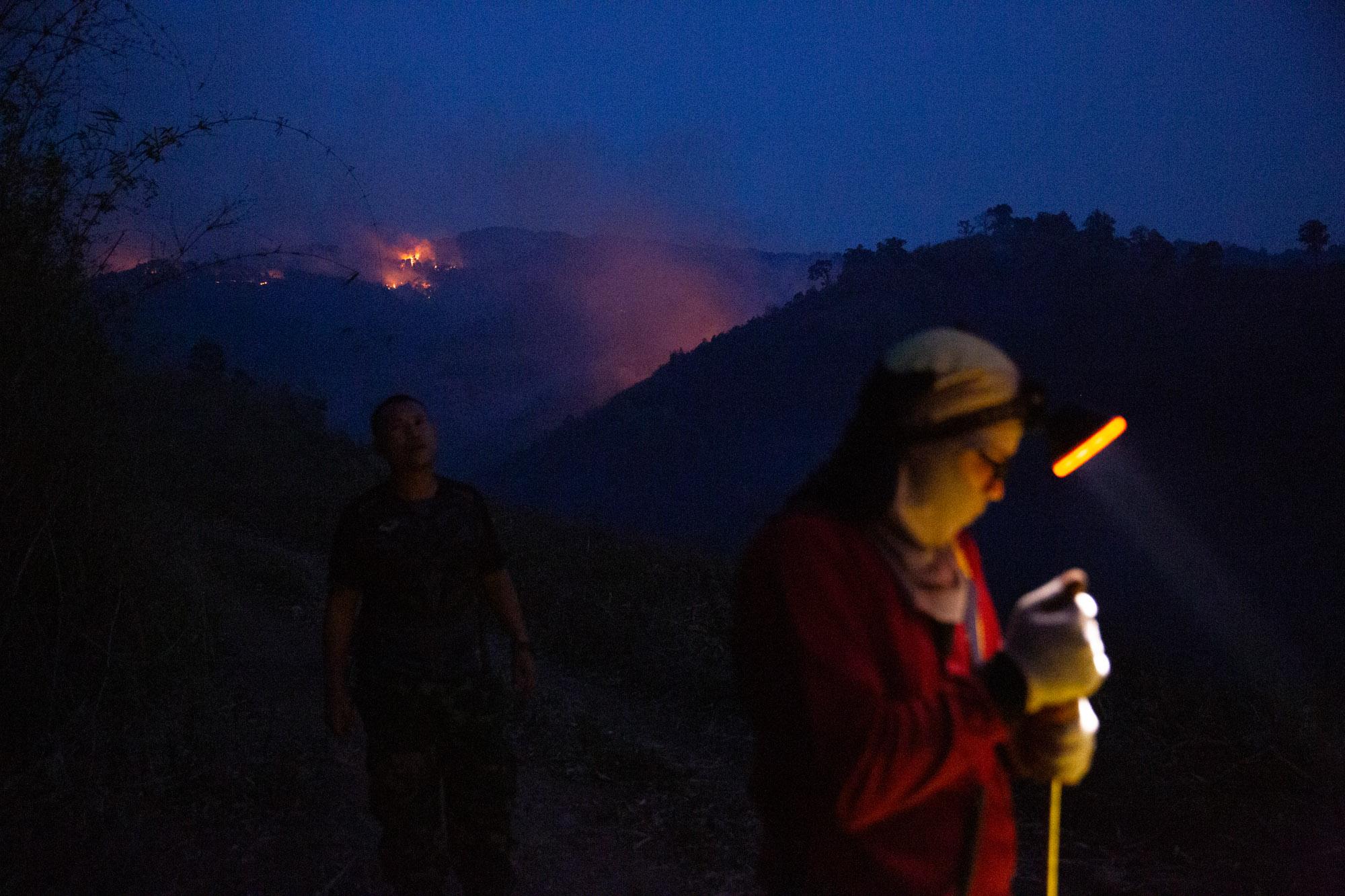 Thailand Burns - A fire fighter from Doi Mae Salong gets ready to put out...