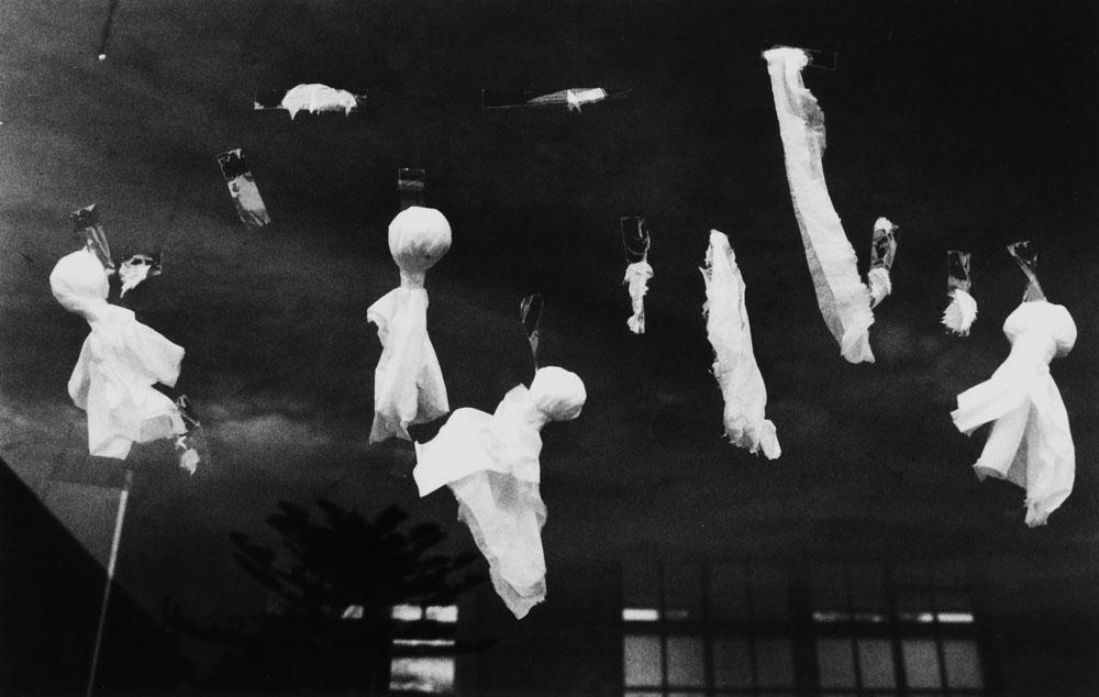 Hachijo:  Isle of Exile - Children's paper dolls hung out the window of the...