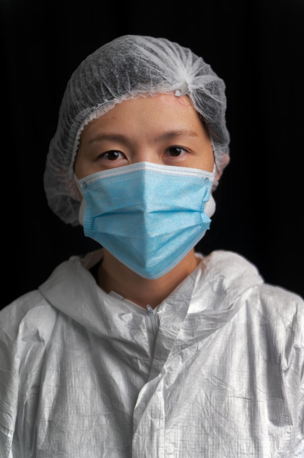 Shih-Hsis Tsai, 39, originally from Taiwan, poses for a portrait inside the COVID unit at Clove...