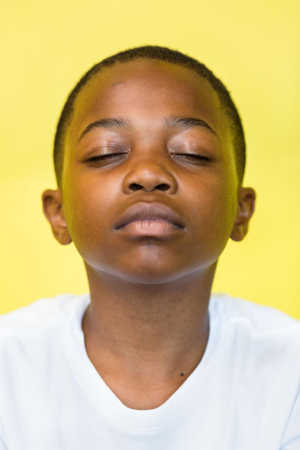SINGLES -  Malachi King (9), meditates at UCSF Benioff...