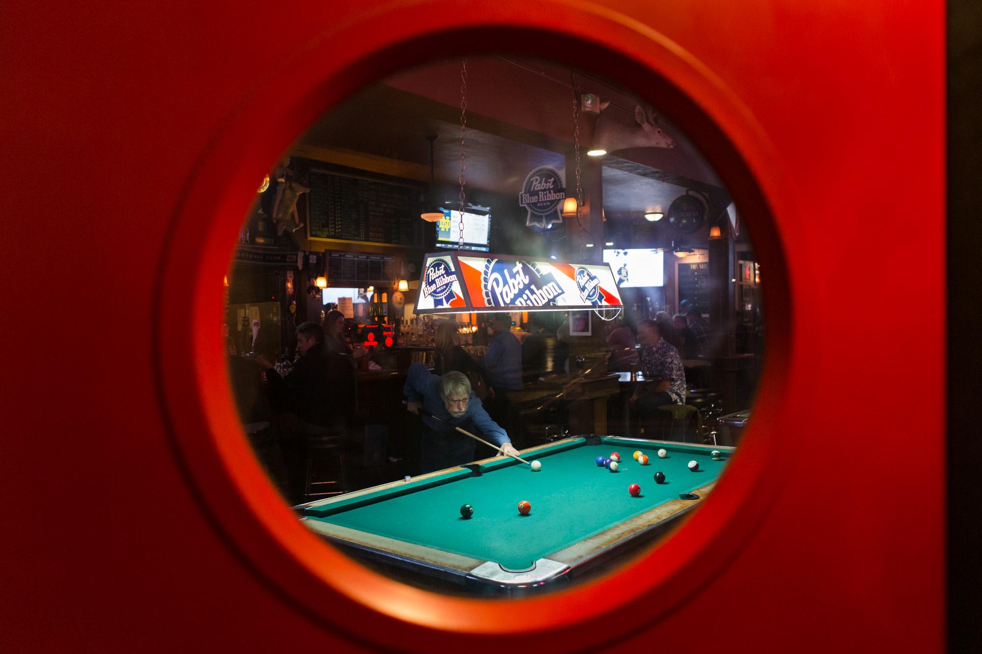 SINGLES -  Ed Rusky plays pool at 2 AM Club in Mill Valley, Calif....