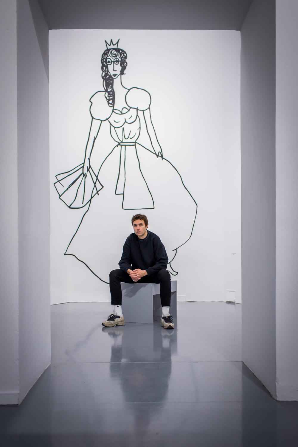 A POLISH MUSEUM TURNS TO THE RIGHT- for NYTimes  - Mr. Radziszewski posing in front of a self-portait from...