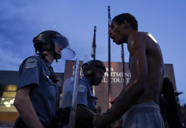 Protesters return to Ferguson on the 6th anniversary of the Micheal Brown Jr. shooting on Sunday, August 9, 2020, in front of the Ferguson Police Department. Samantha Waigand/Missourian