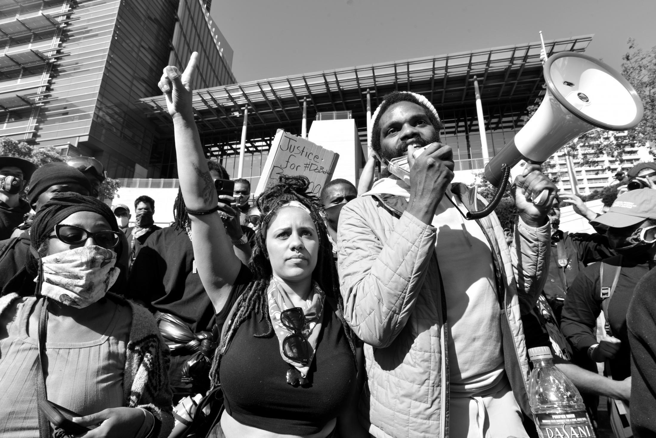 Leading activists give speeches outside of City Hall in downtown Seattle after the protest was followed by the National Guard.