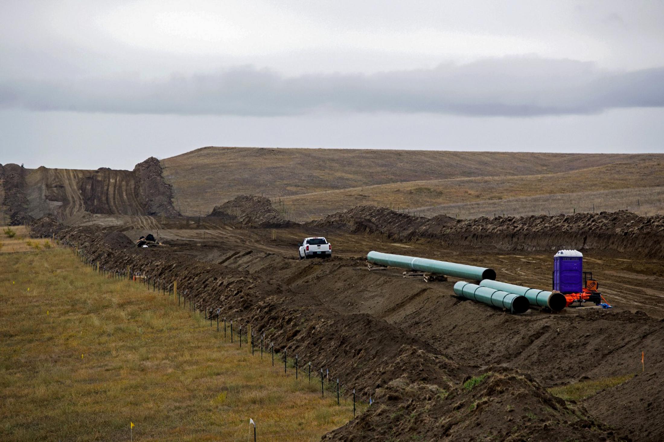 Decolonizing Water - Final pieces of the Dakota Access Pipeline are fitted...