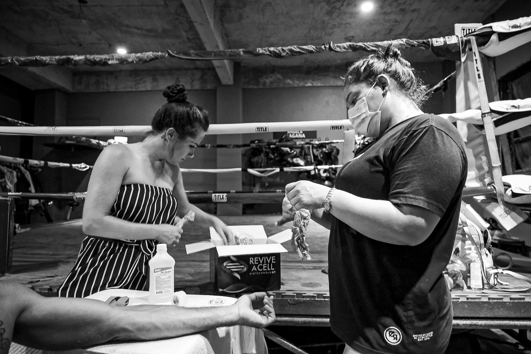 Combat Sports - Coach Angela Magaña and nurse prepare stem cells...