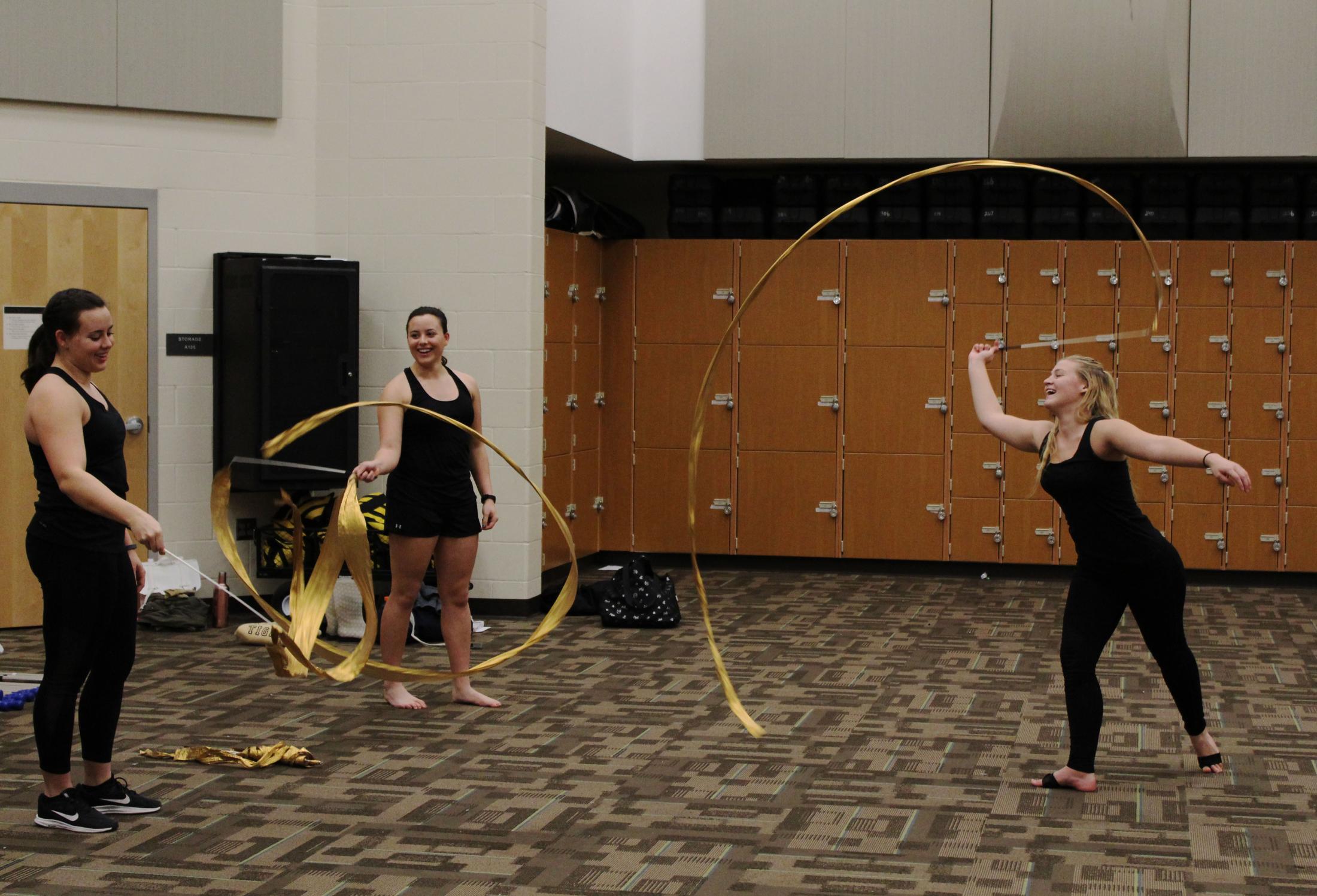Spinning Connections - MU freshman members Erin and Alison Clay twirl ribbons...