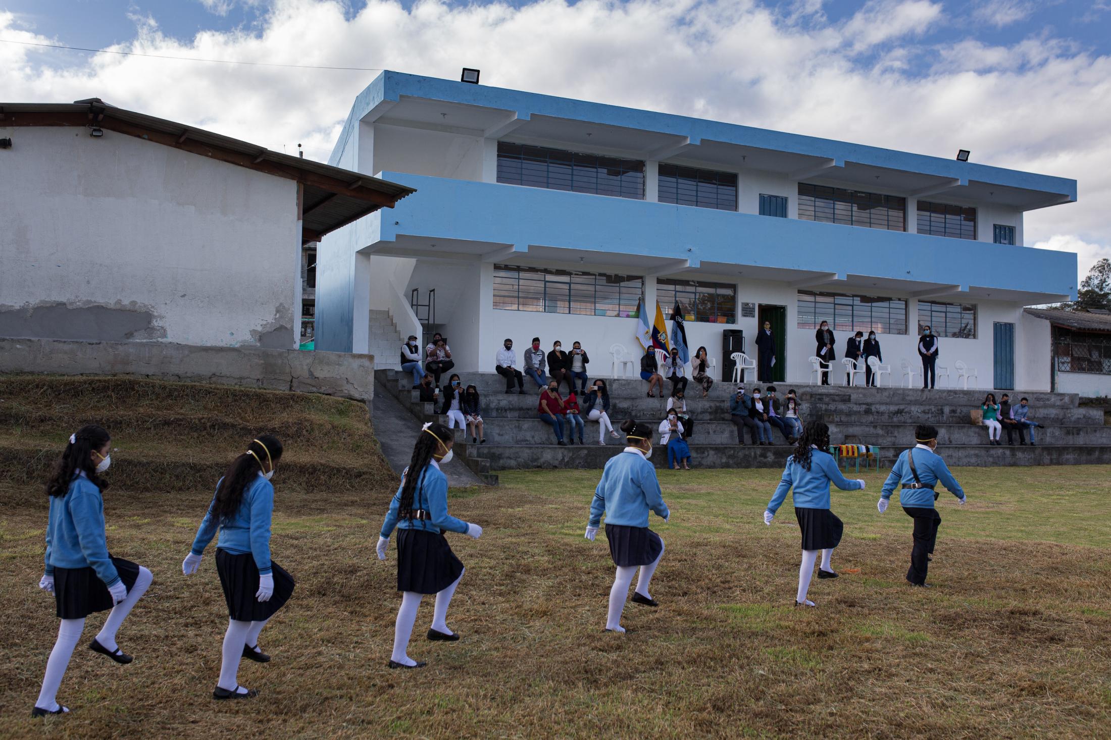 Closing ceremony of the school year held with all biosecurity measures in a rural area of Ecuador. Only the students on the school&#39;s honor roll, along with a family member, were part of the event. June 29, 2020. Cotgchoa-Ecuador. Andr&eacute;s Y&eacute;pez.