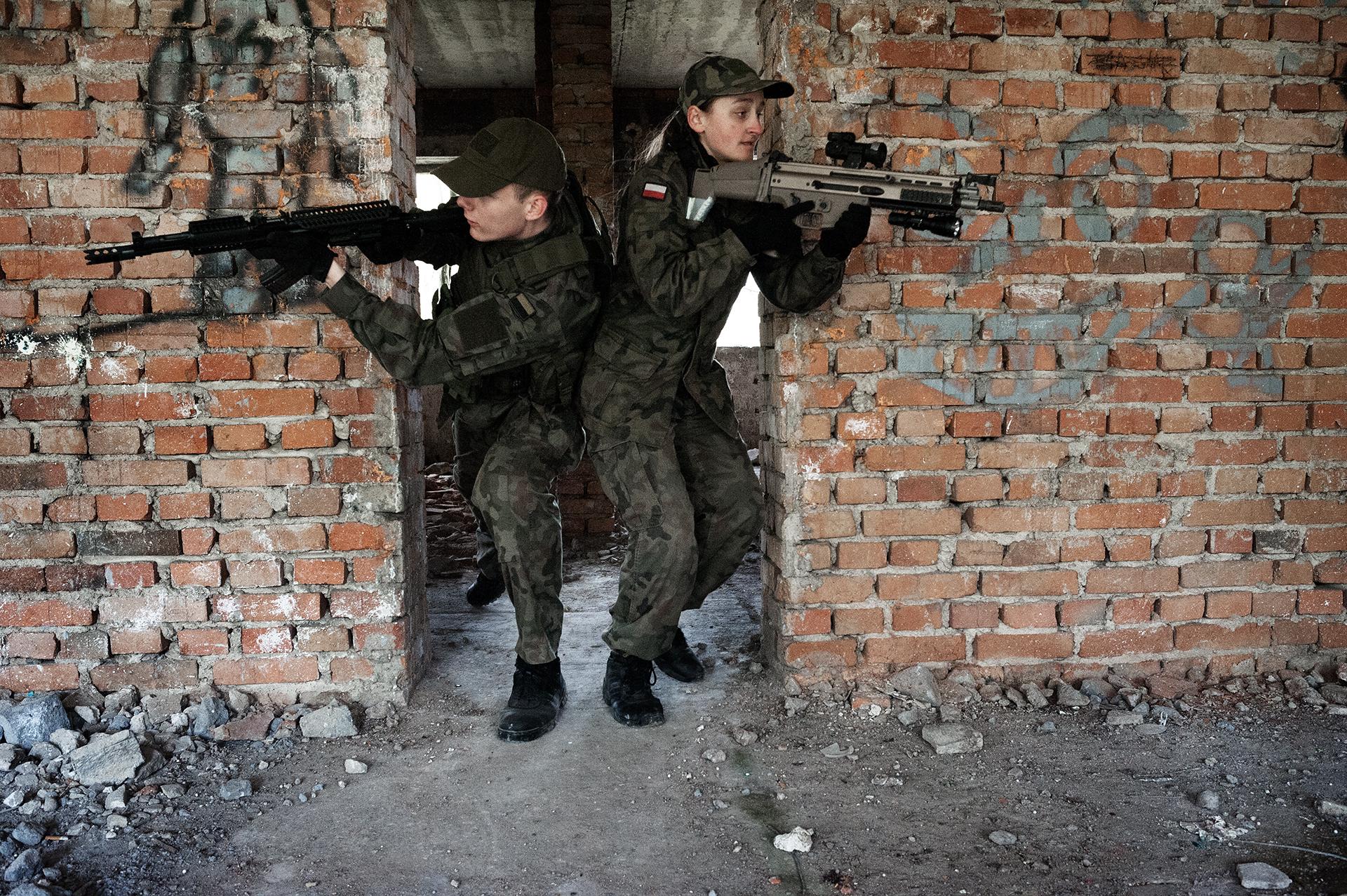  Students (16-19 years old) learn combat tactics in urban areas under the supervision of a...