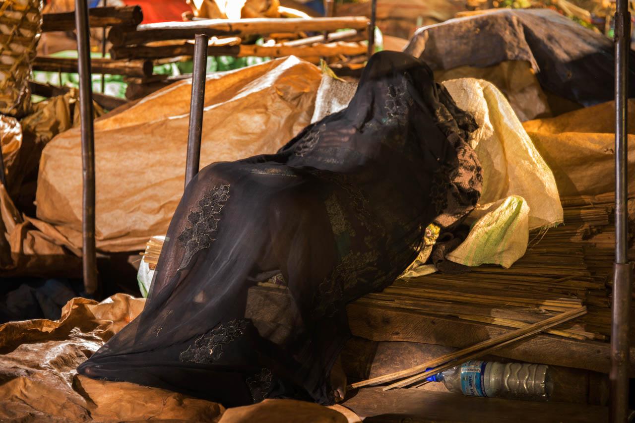 Katumba Badru | Sleeping at the Market - A vendor at Nakawa market deep in sleep.