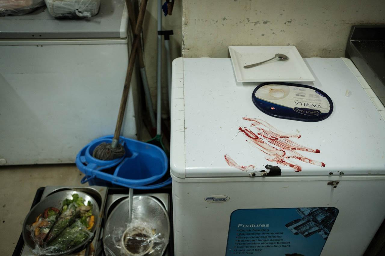 Kabir Dhanji | Nairobi DusitD2 Hotel Attack - A bloody handprint is seen in the kitchen of the...