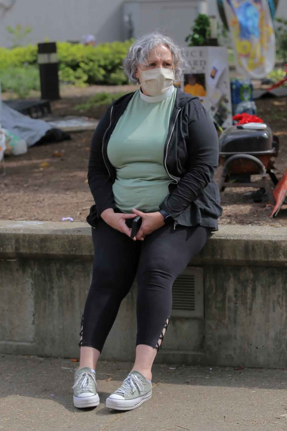 Reverend Karleen Jung sits in Jefferson Square Park on Sept. 24, 2020, in Louisville, Kentucky. Jung found out about the about the decision to not...