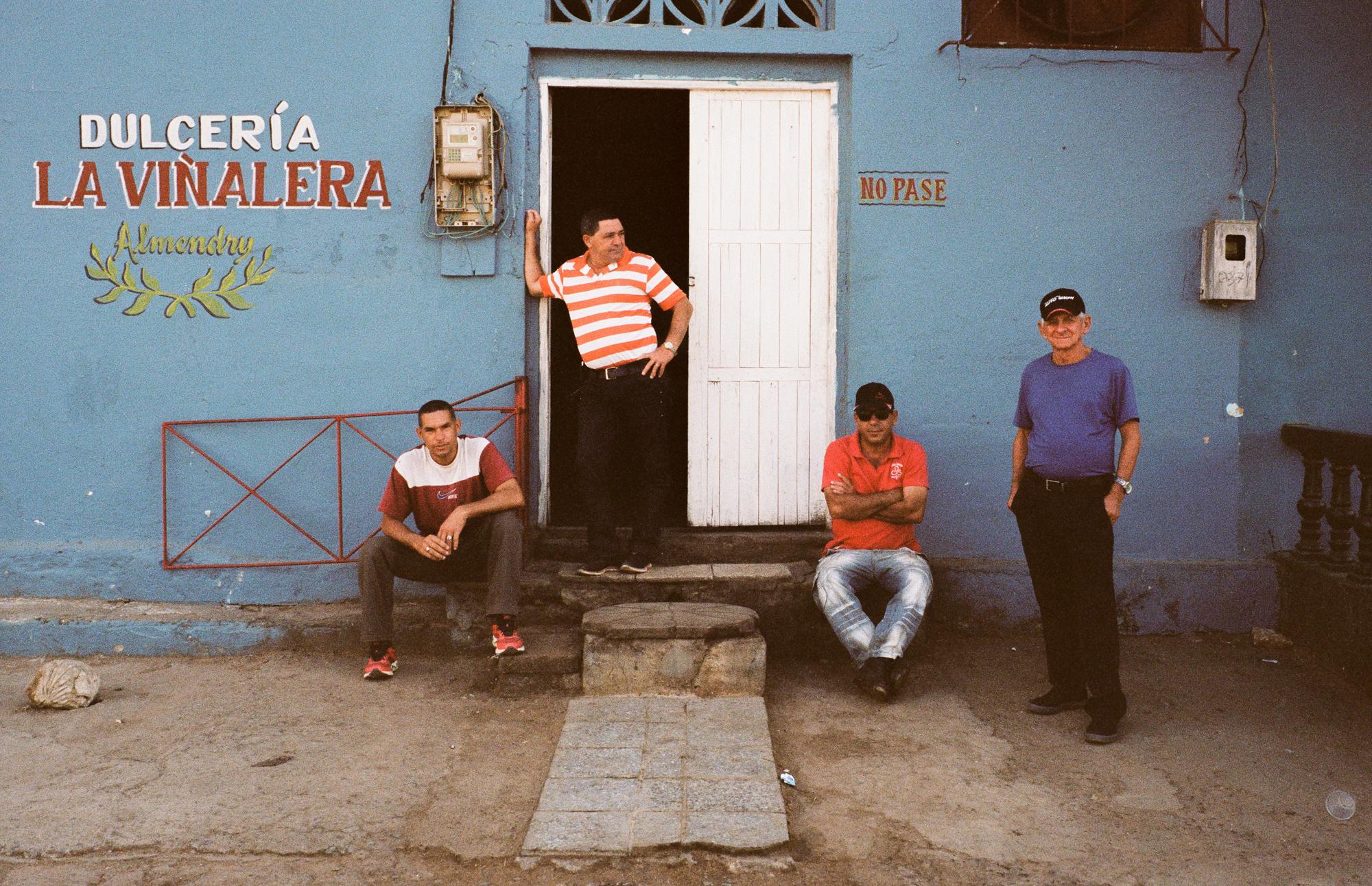 Tobaccoland - VIÑALES.  Locals outside a sweets shop on a...