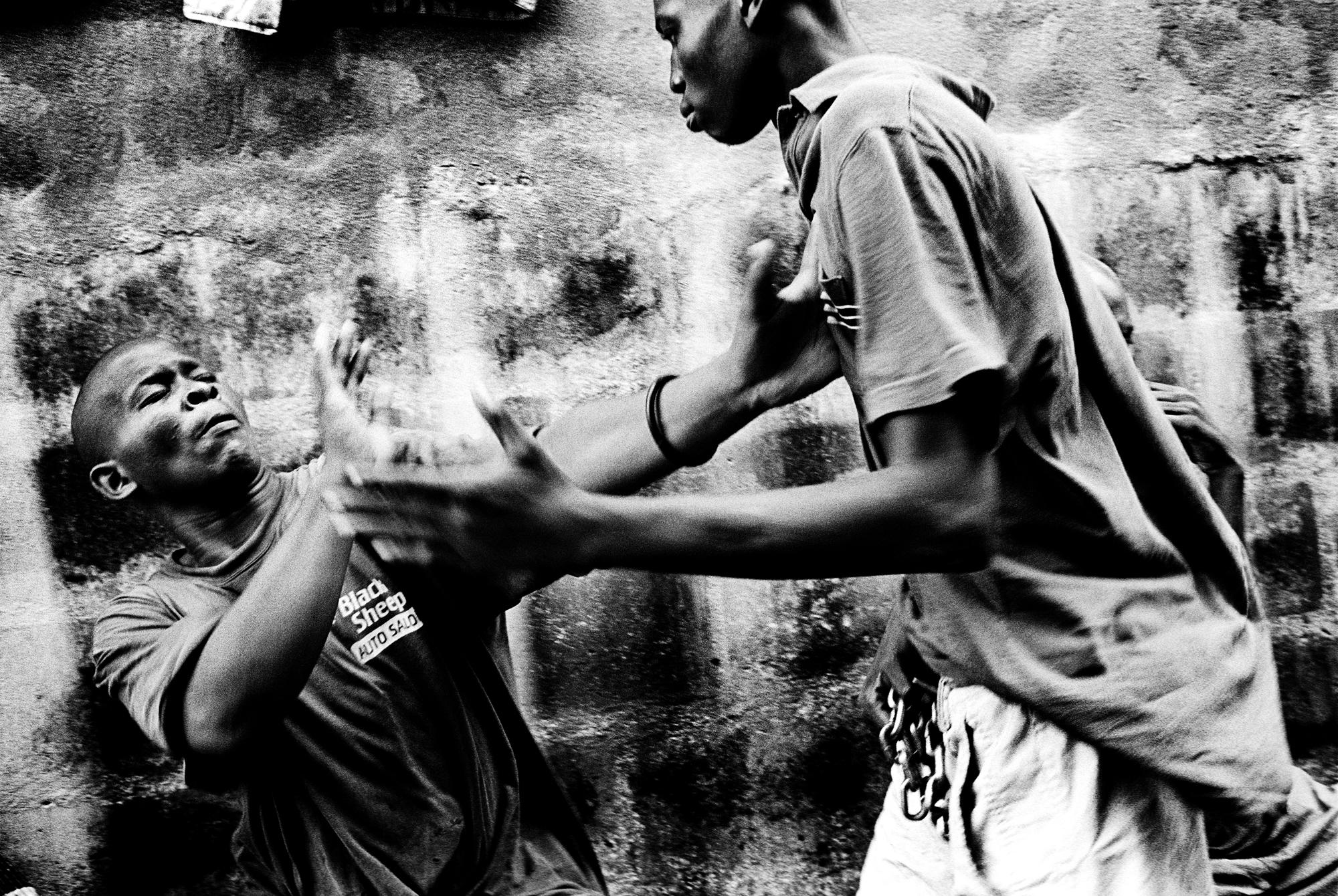 City of rest - SIERRA LEONE Freetown
Two young men fighting at the City...