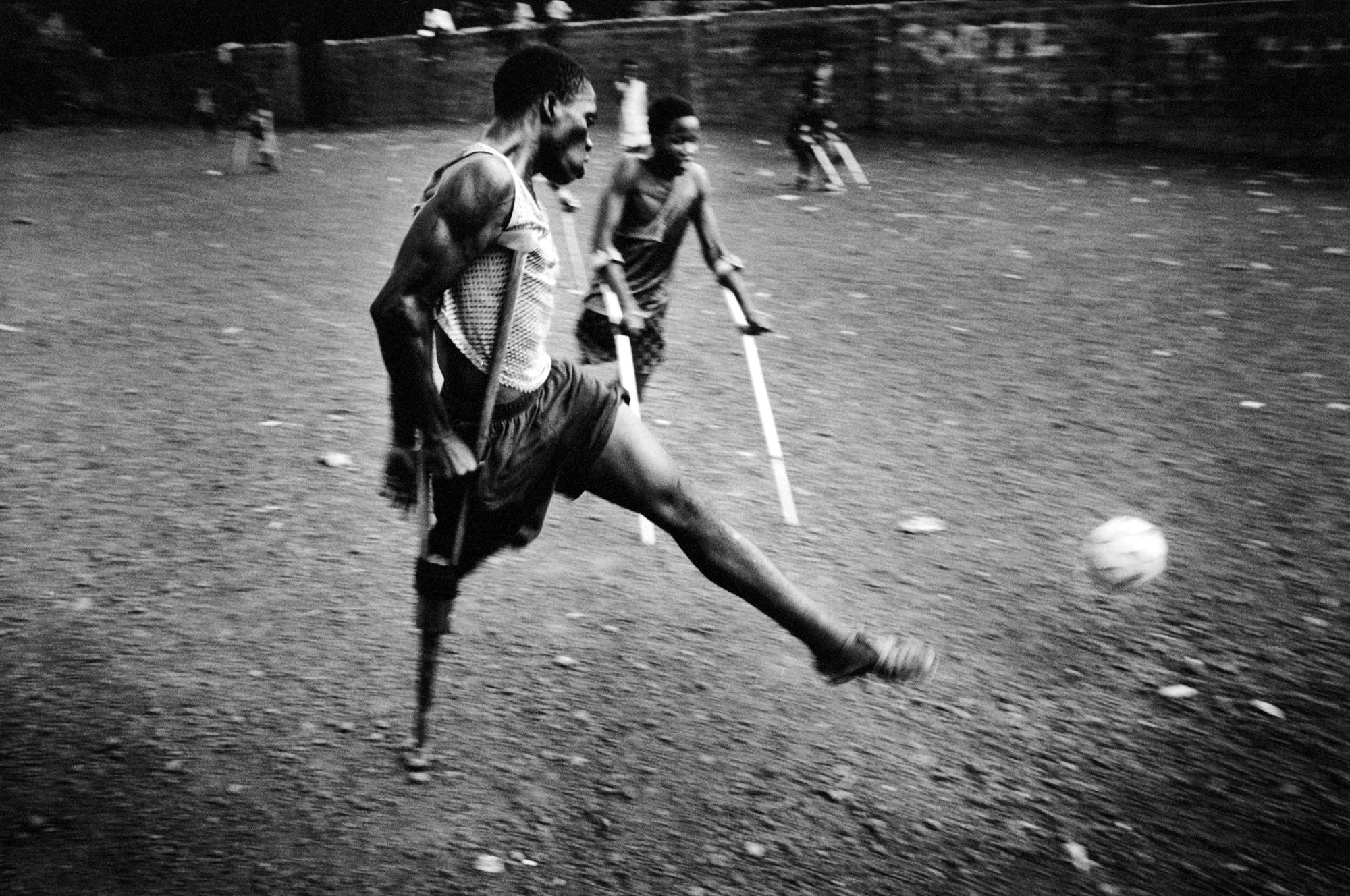 One Goal - Sierra Leone, Freetown, June 2002.
War amputees soccer...