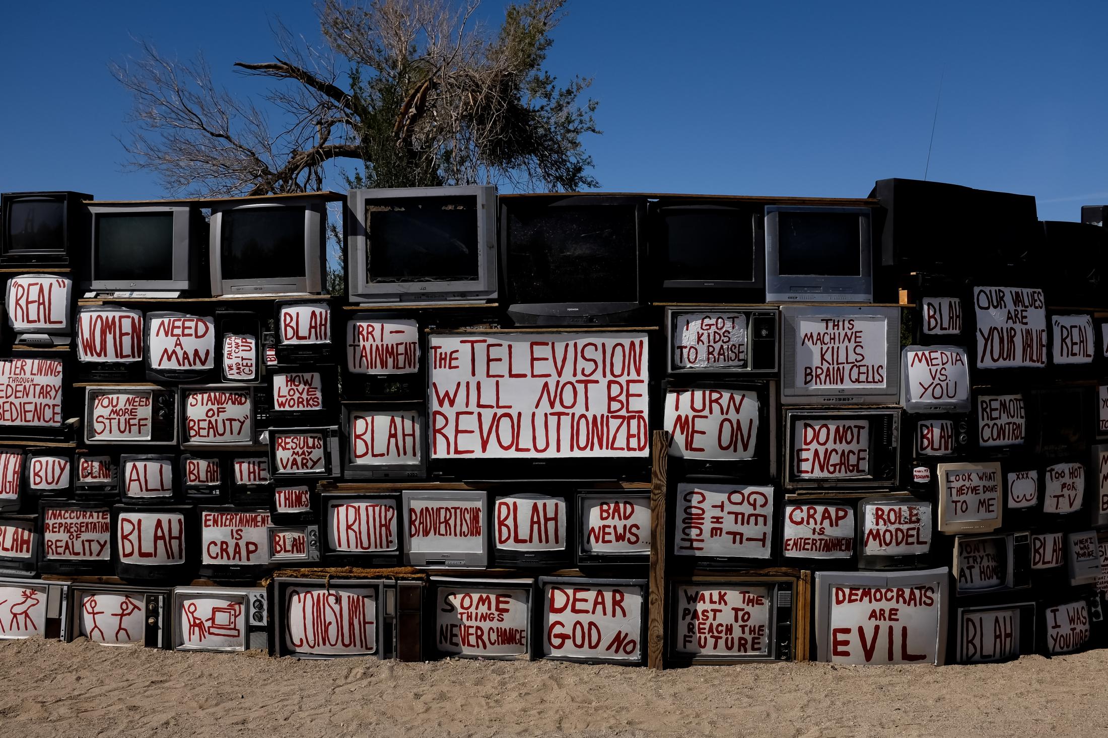 Last Free Place - A famous art piece of a wall of televisions is displayed...