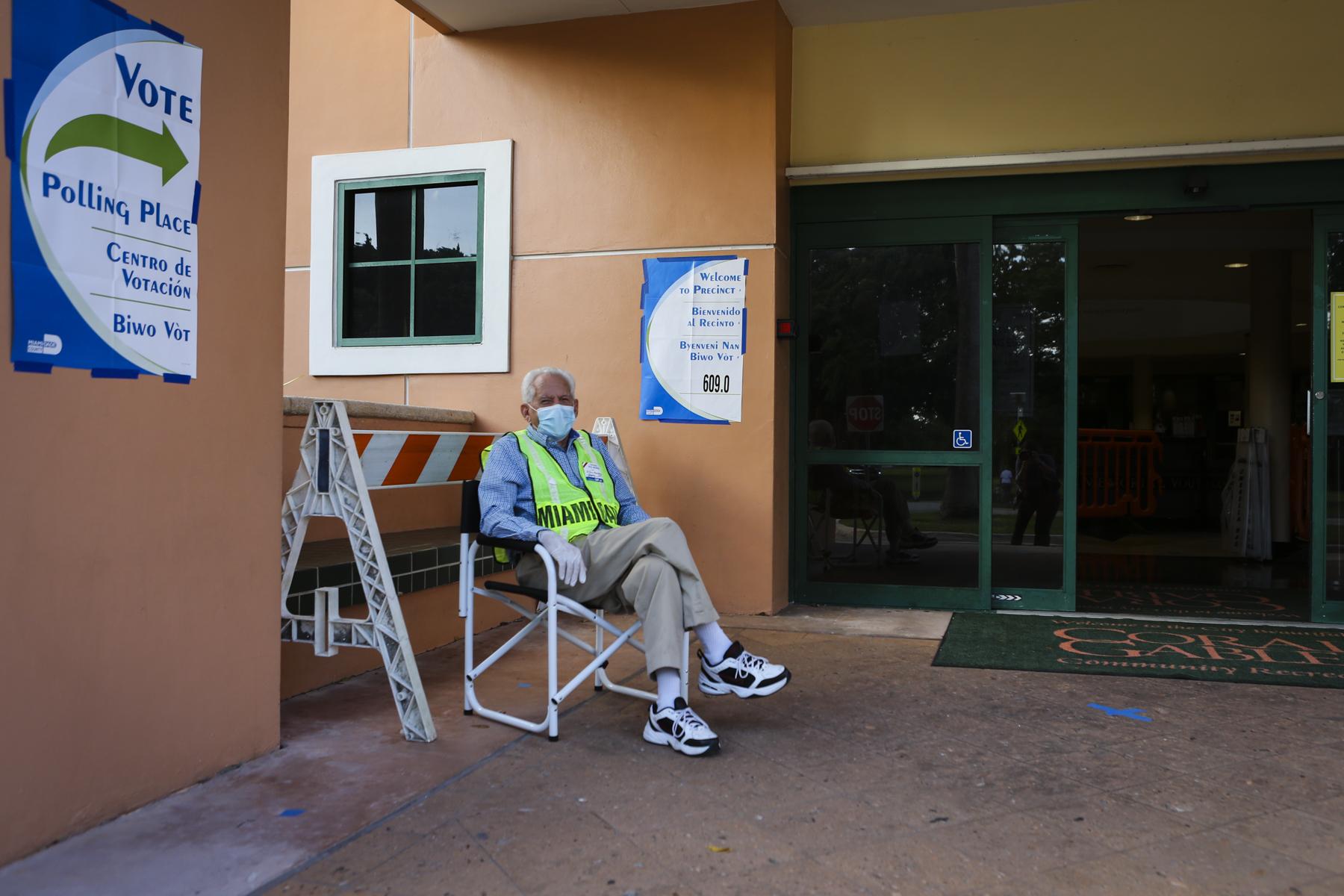 Election 2020 @ Miami, FL - A poll worker waits for voters to come to cast their...