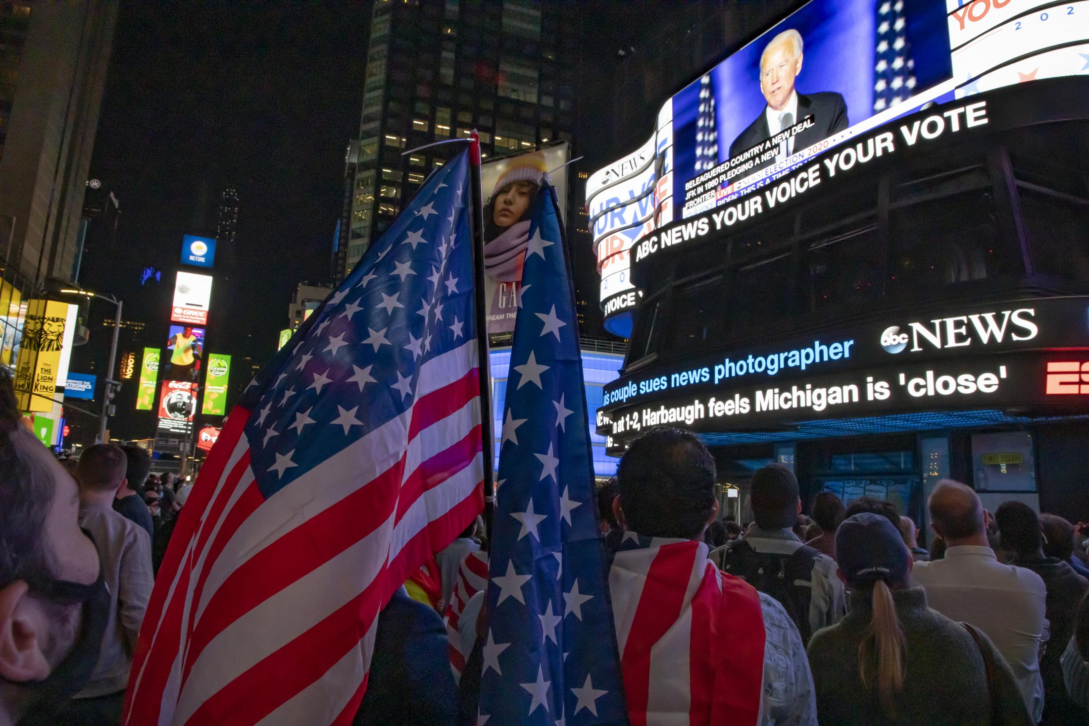 2020 Elections - Crowds gather in Times Square to listen to and celebrate...