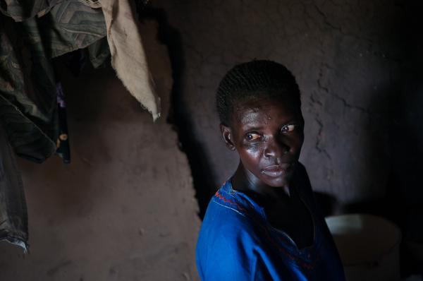 Image from Parenting the Missing - Akot Esther in her hut in Ajoa Gala Village, Lamwo...