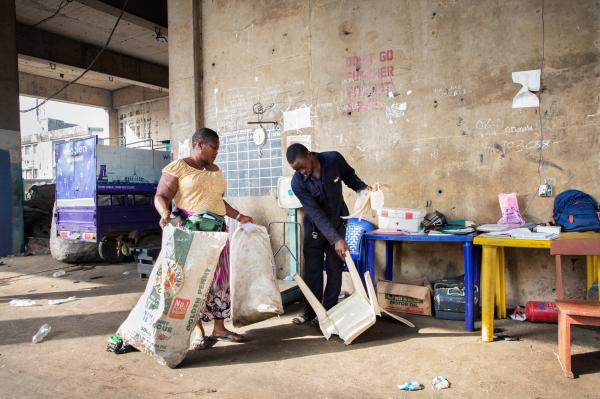 Image from Recycling Lagos  - Wecyclers customer brings a broken plastic chair and...