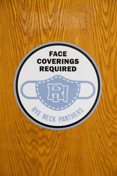 Spaces and Signs (COVID-19) - Wall decal reminding students and staff that face masks...