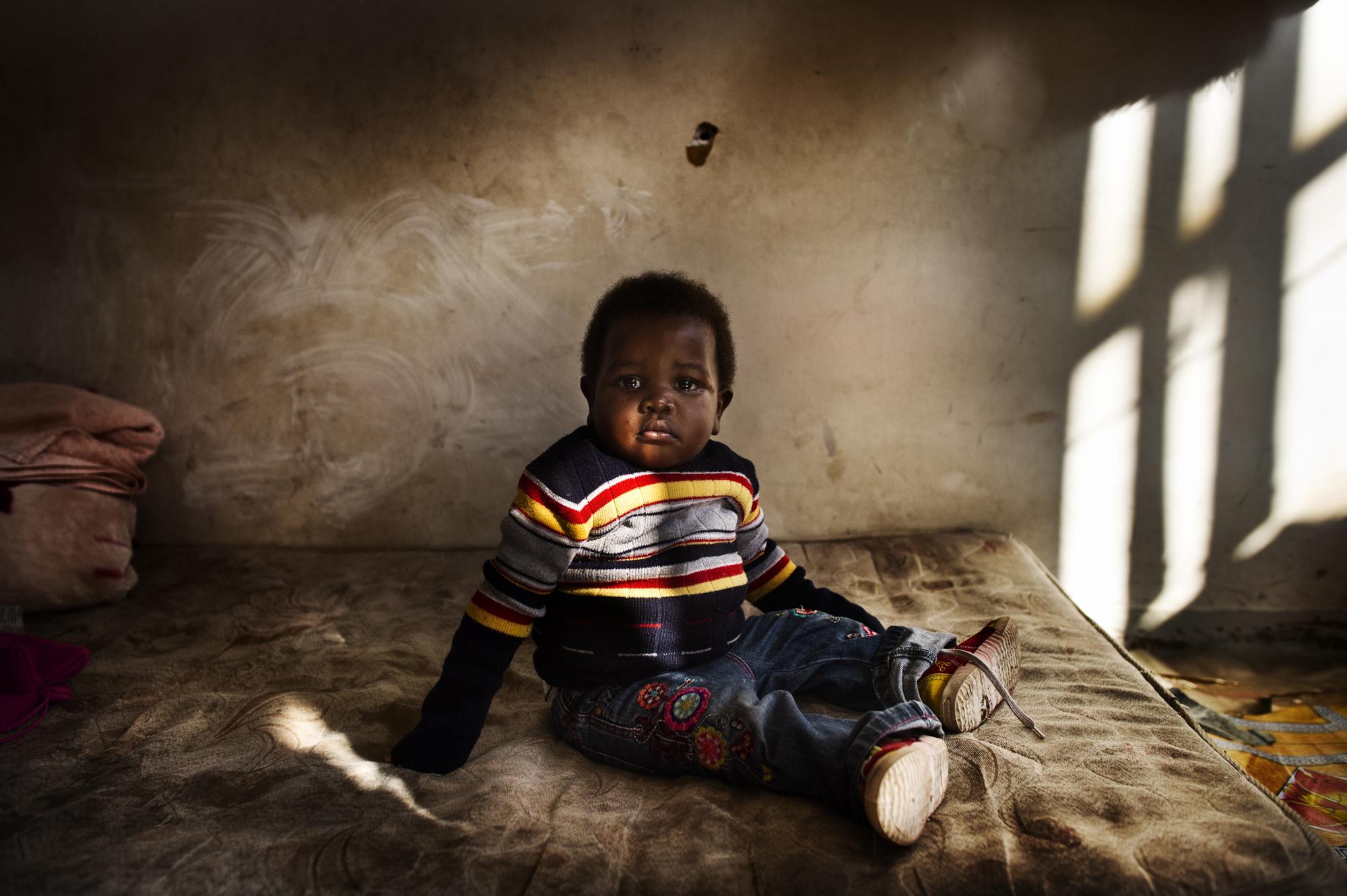 Children of the shadows - Johannesburg, South Africa.June 2012Tanatswa, 1 year...
